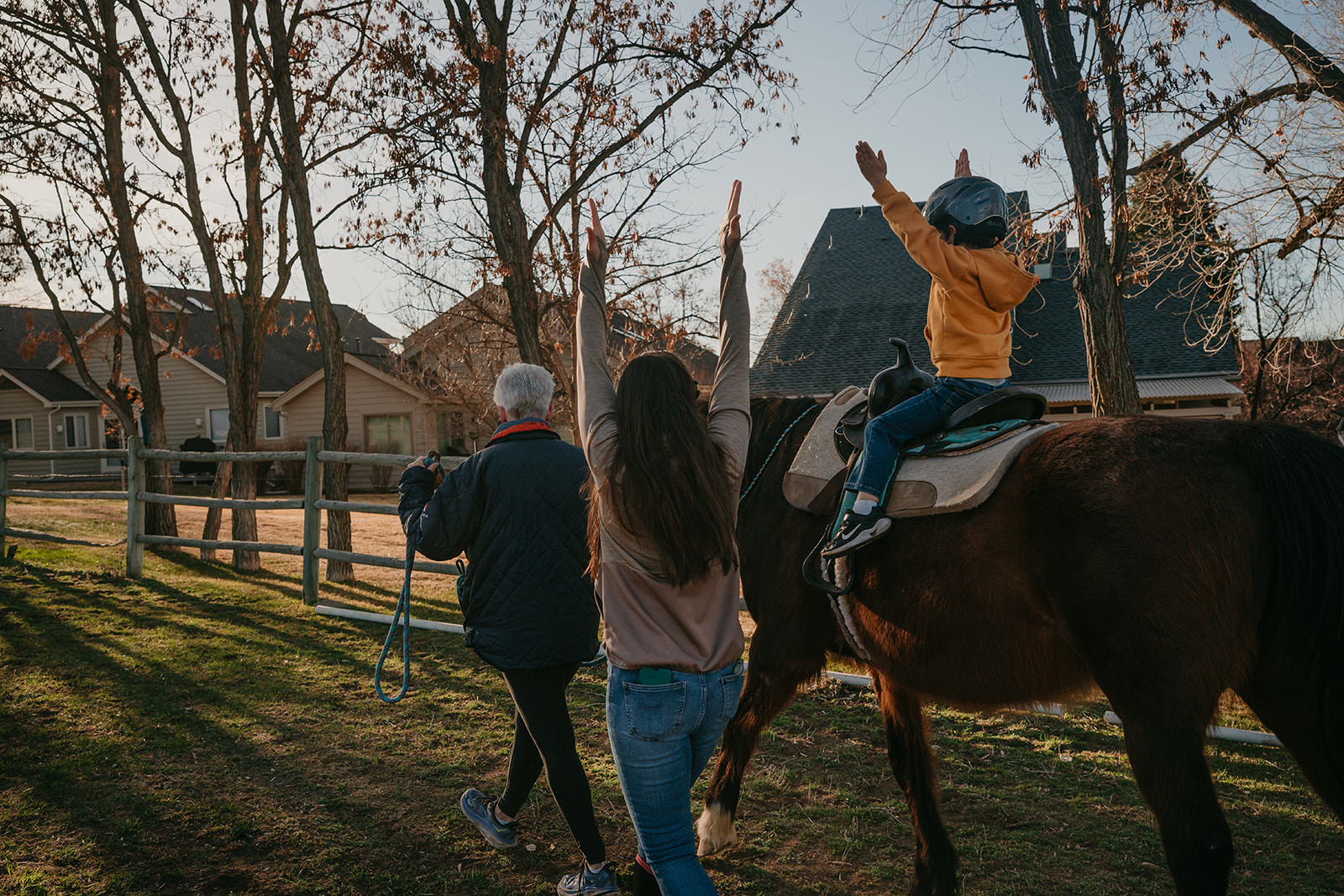 equine therapy branding photos of child in therapy session.