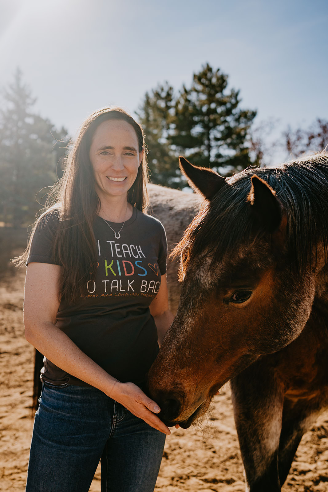equine therapy branding photos of woman headshot with horse.