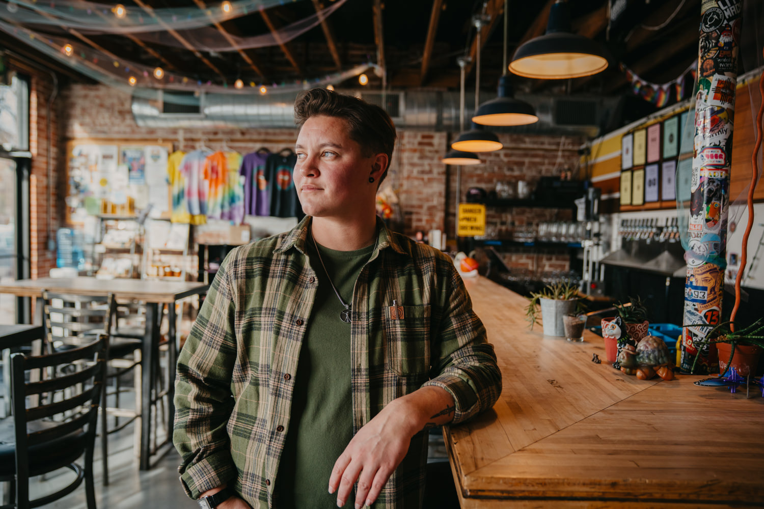 accessibility branding photo of person in brewery.